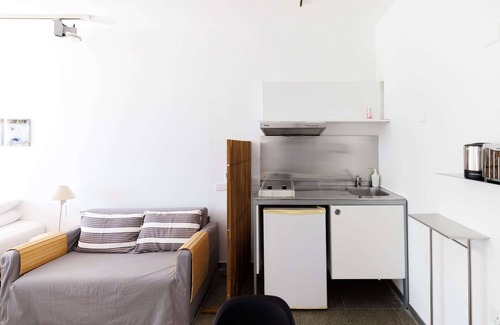 Pentakomo Apartment | Eupnea | Studio Apartment, Art by PraXis Apartments