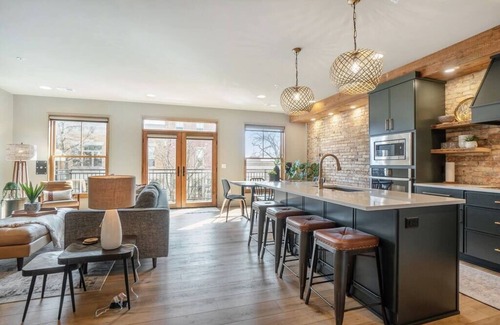 Holland Condo | Evelyn 201: Modern 2-Story Condo with Private Terraces in Downtown Holland