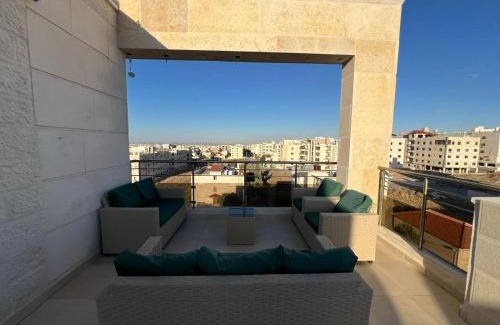 Jordan Apartment | Exclusive Luxury Apartment with Panoramic and Stunning City Views Luxurious Finishes Modern Amenities and Private Terrace شقة فاخرة حصرية بإطلالات بانورامية مذهلة على المدينة تشطيبات فاخرة مرافق حديثة وتراس خاص