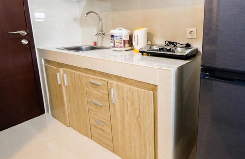 Pinang Apartment | Exclusive Studio Apartment Springwood Residence By Travelio