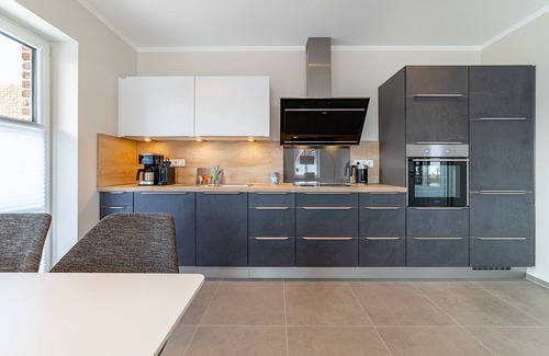 Greetsiel Apartment | Exklusive Ferienwohnung "feerjenkoje" - Moderner Komfort in Zentraler Lage