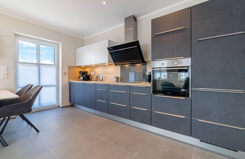 Greetsiel Apartment | Exklusive Ferienwohnung "feerjenkoje" - Moderner Komfort in Zentraler Lage