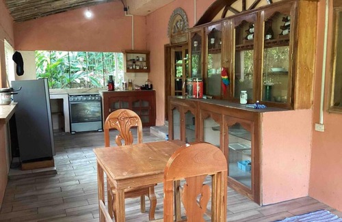 Tuxtla Chico House | Exotic flower cabin pool