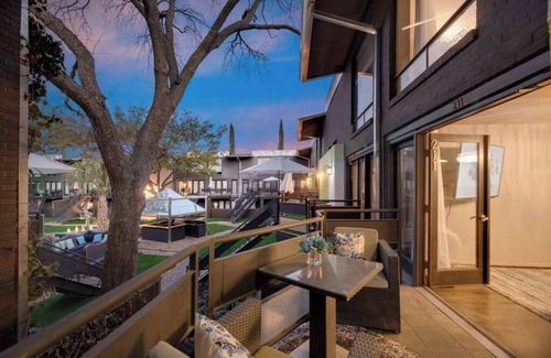 Lower Greenville Condo | Expansive 2-bed loft with fireplace, full kitchen, smart TVs, and access to an award-winning courtyard & resort pool.