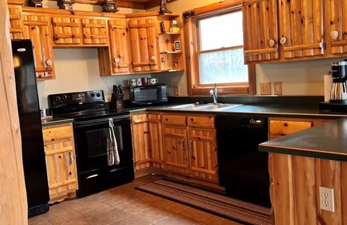 Vienna Township House | Explore Michigan's Elk Country At This Cabin Retreat-Outdoor Enthusiast Dream