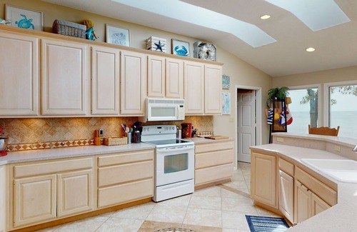 Freeport House | Exquisite Waterfront Home, Dog-Friendly, Game Room