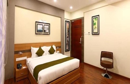 Vadapalani Hotel | FabHotel Prime Adore Residency
