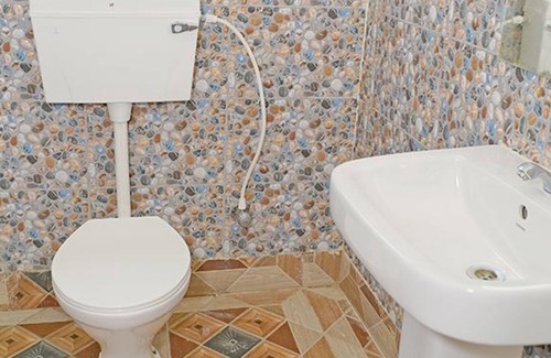 Bakkhali Hotel | FabHotel Prime Indeedcare