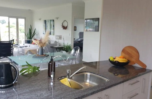 Gulf Harbour House | Fabulous 1 bedroom apartment with views over a perfect little lake. n