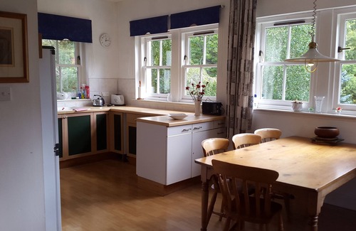 Braemar House | Fabulous sunny house in large private gardens. Sun porch & patio. Mountain views
