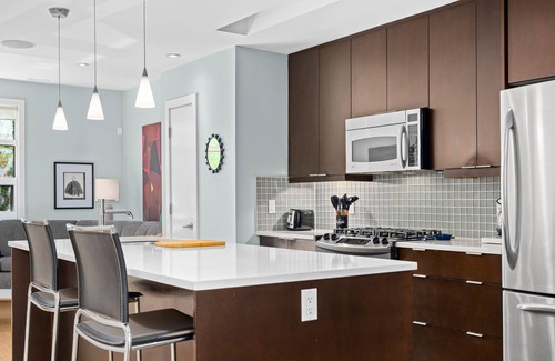 Bridgeland House | Family-friendly 2 bed/2bath with Stunning Rooftop Patio, BBQ, & Steam Shower!