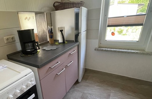 Neukalen House | Family-friendly bungalow with fireplace, terrace, barbecue