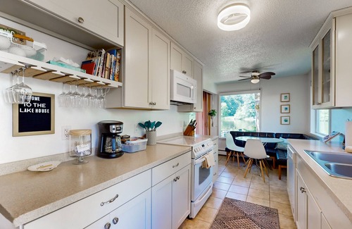East Olympia House | Family-friendly lakefront escape with outdoor dining, gas grill, kayaks and W/D