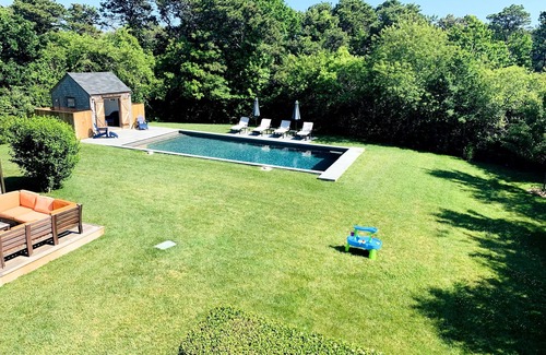West of Town House | Family Friendly Oasis: Private Acre, Heated Pool, Bikes, Walk to Town & Brewery