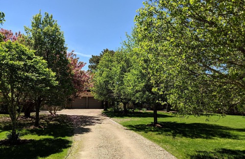 West of Town House | Family Friendly Oasis: Private Acre, Heated Pool, Bikes, Walk to Town & Brewery