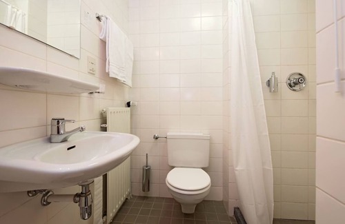 Vlijmen Hotel | Family-friendly Room Near Golf Courses and Nature Trails in Brabant w/Parking
