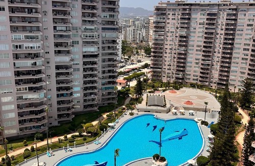 Mezetli Apartment | Family-Friendly Seafront 3BR Pool Aquapark & Sunset Views AC