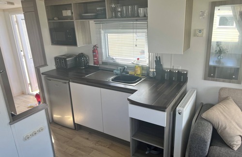 Towyn House | Family fun retreat at our caravan swift stays with everything you need around.