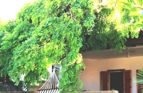 Torre Saracena House | Family holiday home 'Cristian Domus' with sea view, garden and terraces
