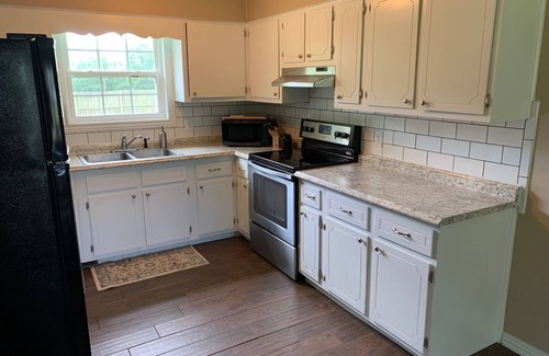 Morris Chapel House | Family home about a mile from Shiloh Park. Pet friendly with a fenced-in yard!