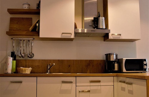 Achenkirch Apartment | Family room with 3 bedrooms