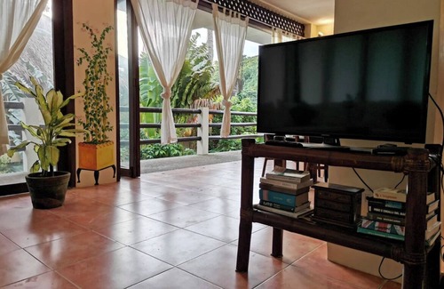 Balabag Apartment | Family Studio with panoramic windows to tropical greenery. 3 min to the beach