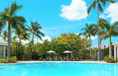 New Town Apartment | Fantastic Land and Sea Vacation! Outdoor Pool, Short Drive To The Beach!