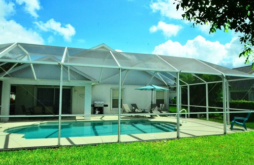 Beachwalk Isles House | Fantastic location directly on the lake, with pool and sun terrace on the west side