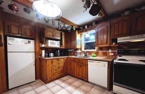 Pontiac Ski Chalet | Fantastic view cosy retreat by the river with forests and swamps to explore.