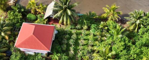 Taha'a Resort | Fare Piti Les pieds dans le lagon