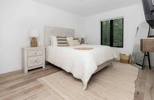Kemble House | Farmhouse chic on Georgian Bluffs, where luxury meets comfort.