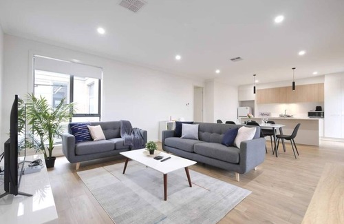 Woodville North House | FEEL HAPPY & AT HOME HERE. No stairs. Modern designer space. Ducted A/C. Double garage.