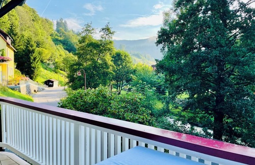 Schoenmuenzach House | Ferienhaus Oesterle - Idyllic Black Forest house by a stream with terrace & balcony