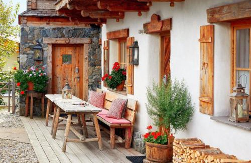 Hundsdorfl House | Ferienhaus im Almdorf in Flachau