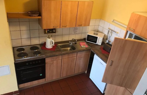 Zandt Apartment | Ferienhaus mit 2 Schlafzimmern, Kaminofen, Terrasse und Garten