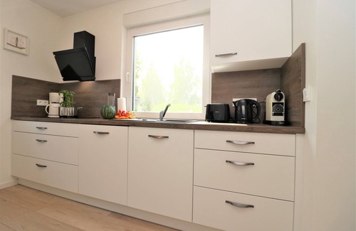 Neuhaus Apartment | Ferienwohnung mit Terrasse und Garten in Strandnaher Lage
