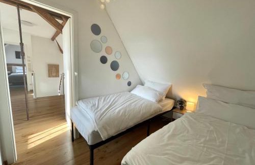 Mering Apartment | Ferienwohnung "Alpspitze" - Familienfreundliche Maisonette in Mering