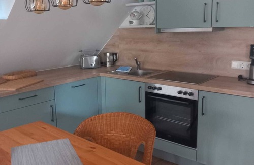 Pilsum Apartment | Ferienwohnung Amelie im Herzen Pilsums