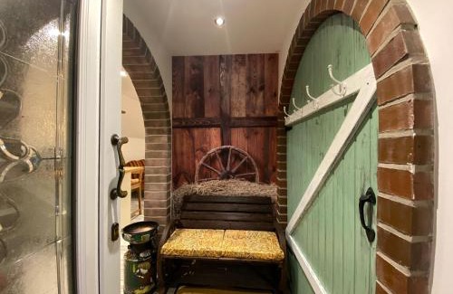 Augustfehn Apartment | Ferienwohnung Gulfhaus, mit Sauna und großem Garten