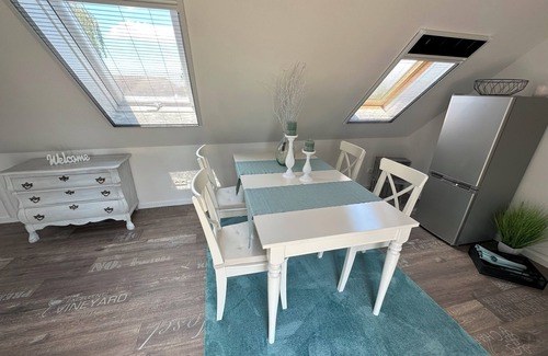 Kreitlapperei Apartment | Ferienwohnung "huus An`t Koornfeld" Dachgeschoss mit Loggia