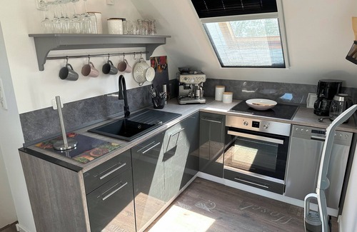 Kreitlapperei Apartment | Ferienwohnung "huus An`t Koornfeld" Dachgeschoss mit Loggia