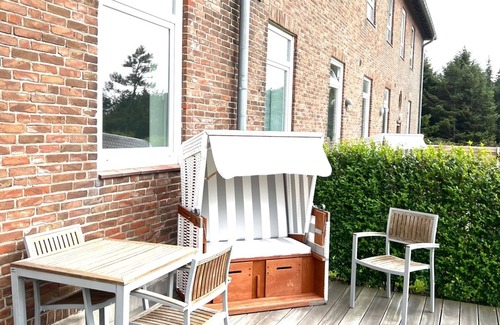 Rantum Apartment | Ferienwohnung im Erdgeschoss mit Eigener Holzterrasse