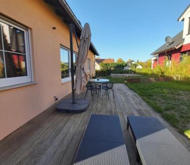 Wasserlos Apartment | Ferienwohnung mit Terrasse am Rosengarten