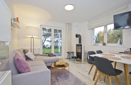 Lietzow Apartment | Ferienwohnung mit Terrasse, Kamin, Sauna - Ferienresidenz Zwei Bodden FeWo 2-6