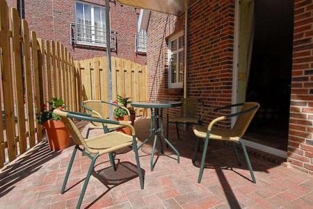 Neuharlingersiel Apartment | Ferienwohnungen Haus Hafenperle
