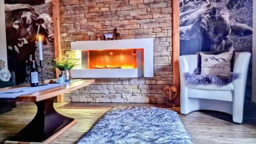 Ried Apartment | Ferienwohnungen Wolf - Wohnung" Kienberg" mit Bergblick