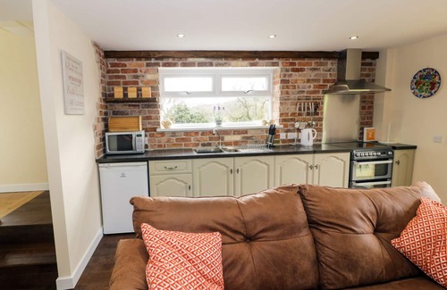 Llangynin Cottage | FFYNNONLWYD COTTAGE, family friendly, with hot tub in St Clears