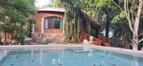 Homun House | Finca Oz