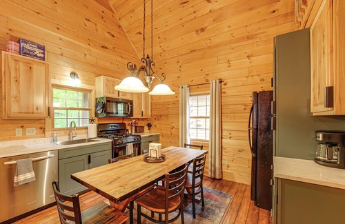 Oceana County Cabin | Fire Pit & Porch: Warm & Woodsy Rothbury Escape!