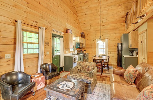 Oceana County Cabin | Fire Pit & Porch: Warm & Woodsy Rothbury Escape!
